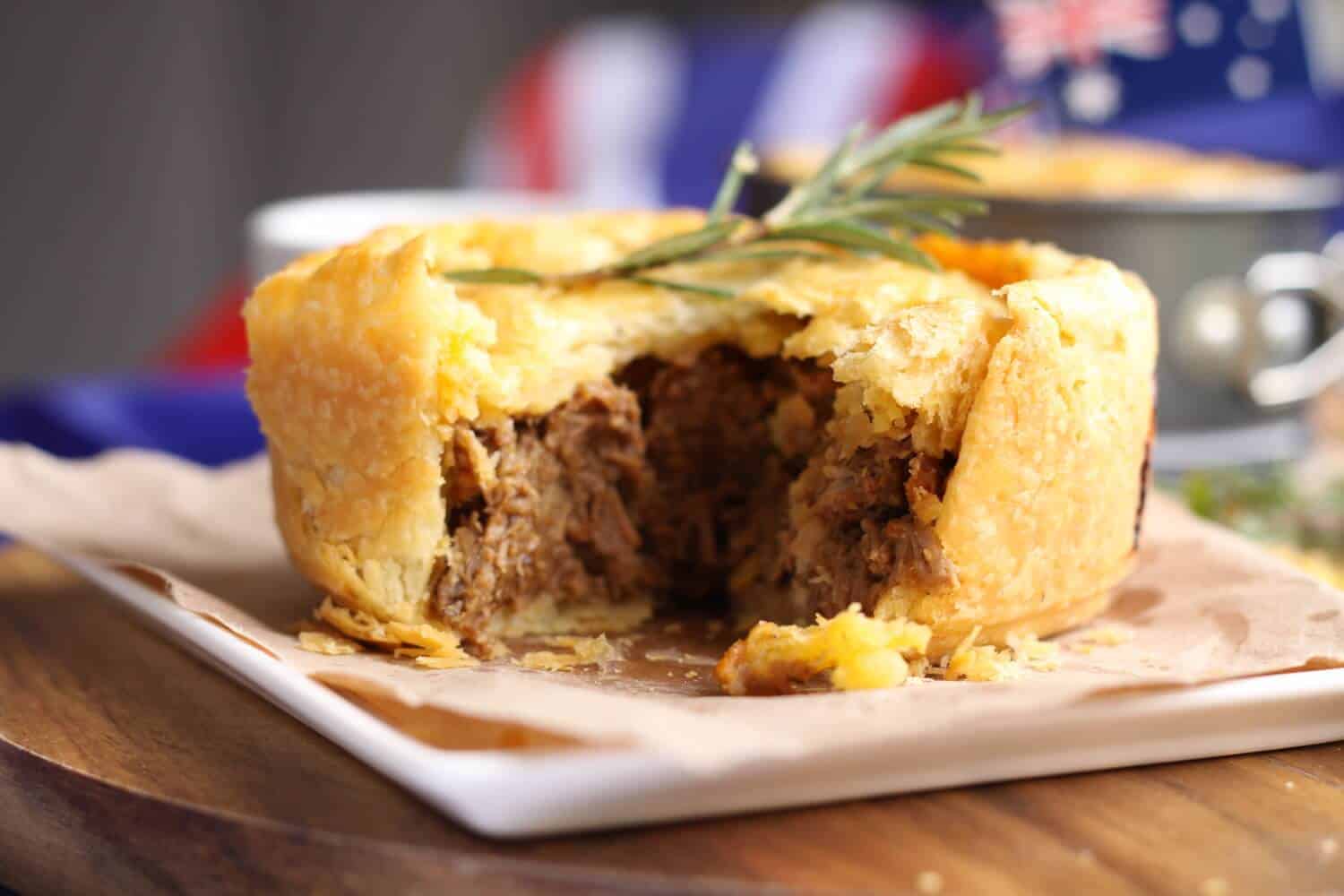 A lamb pie cut open to show the inside.