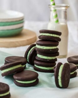 Easy to make, crisp dark chocolate cookies filled with a mint buttercream. These Chocolate Peppermint Cookies make a fun afternoon snack.
