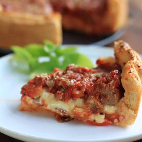 Deep Dish Pizza by Sugar Salt Magic - Chicago style Pizza Pie. A thick layer of mozzarella, pepperoni and sausage all topped off with a homemade pizza sauce