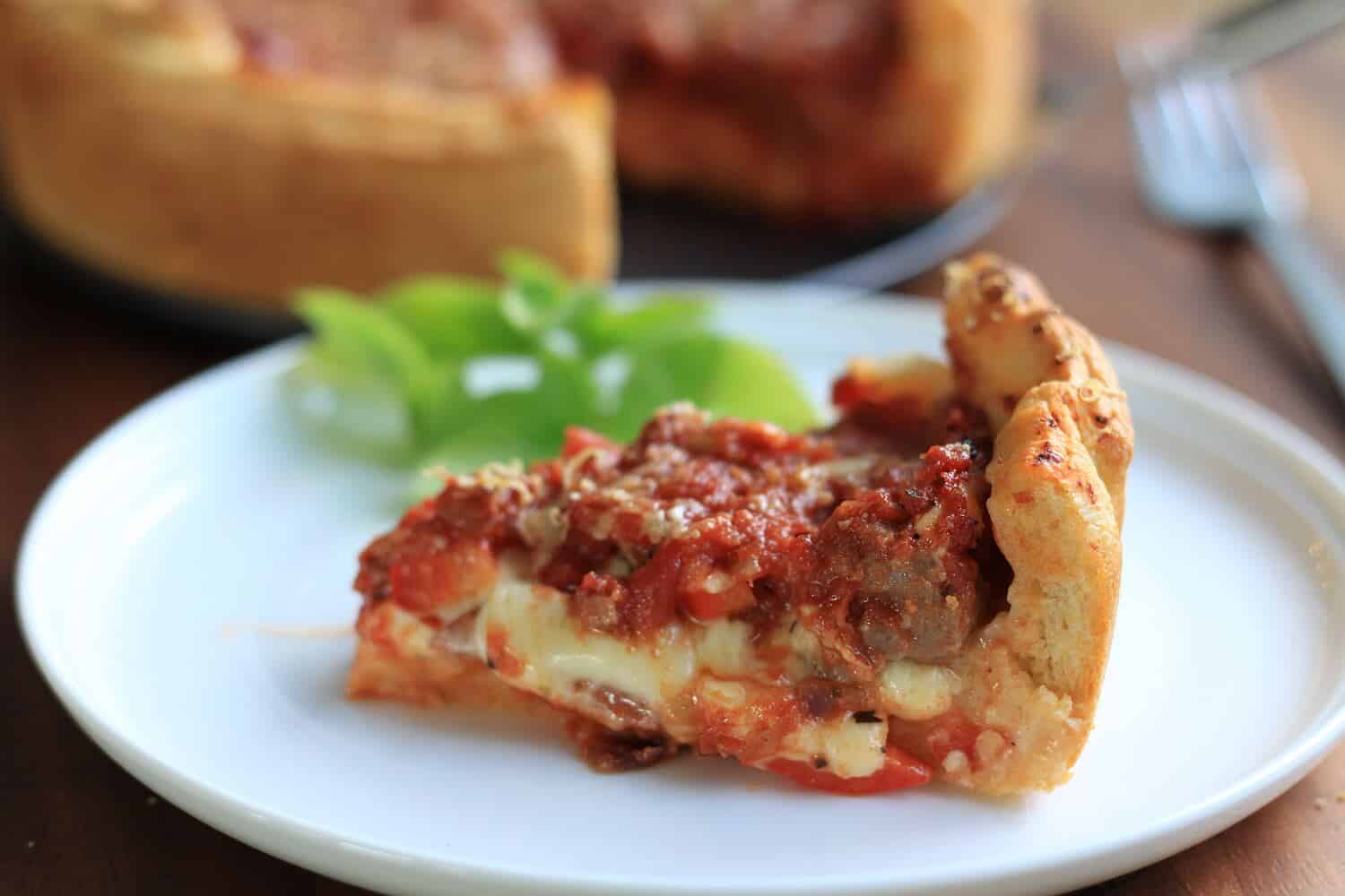 Deep Dish Pizza by Sugar Salt Magic - Chicago style Pizza Pie. A thick layer of mozzarella, pepperoni and sausage all topped off with a homemade pizza sauce