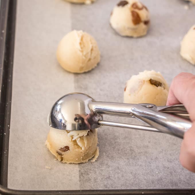 Scooping the dough for Buttery Sultana Cookies