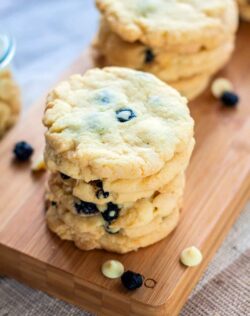 Buttery White Chocolate Blueberry Cookies. The perfect crispy and chewy, buttery cookie filled with dried blueberries and white chocolate & ready in less than half an hour