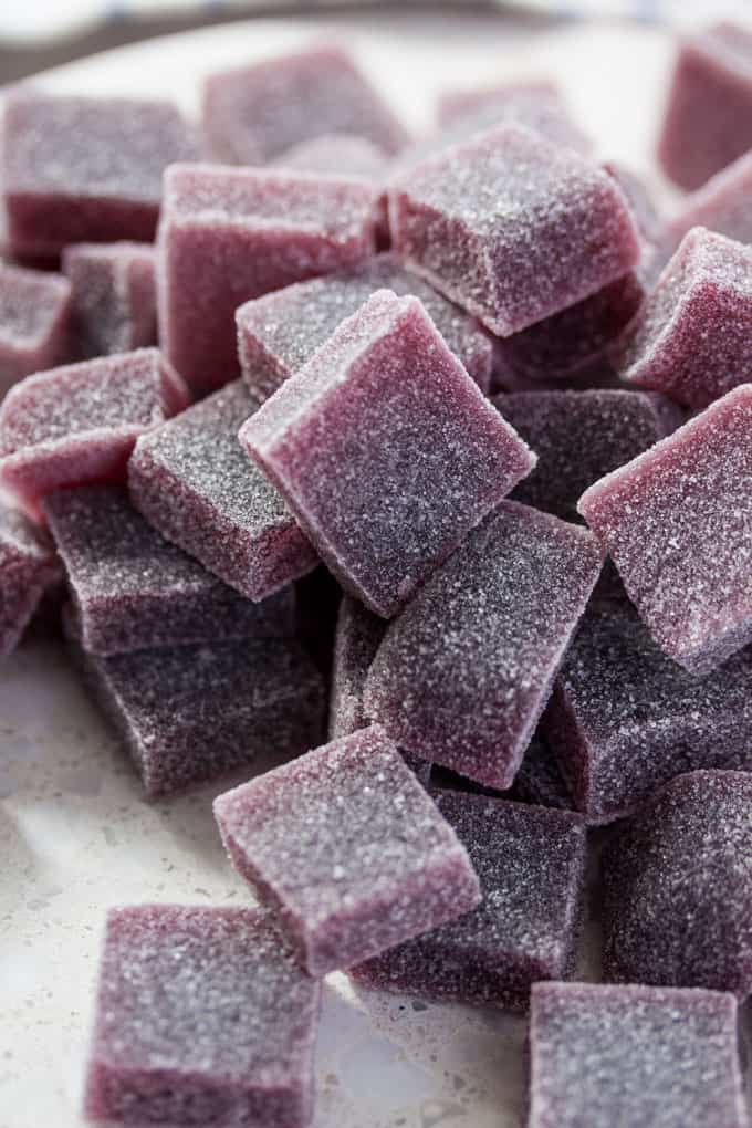 Close up of a pile of cherry gummies.