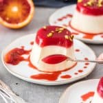Buttermilk Panna Cotta is sweet and creamy but also a little tangy. A super quick and easy dessert, this one is topped with blood orange jelly.