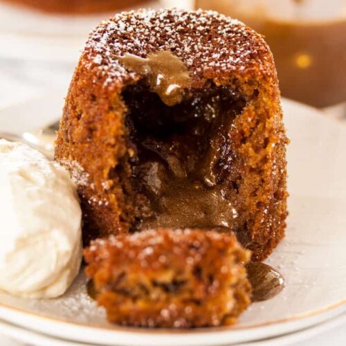This Mini Molten Lava Cake Recipe is an indulgent treat just perfect for the festive season. Filled with butterscotch 'molten lava', it's a take on a sticky date cake using dried Christmas fruits. #butterscotch #lavacakes #christmasdesserts