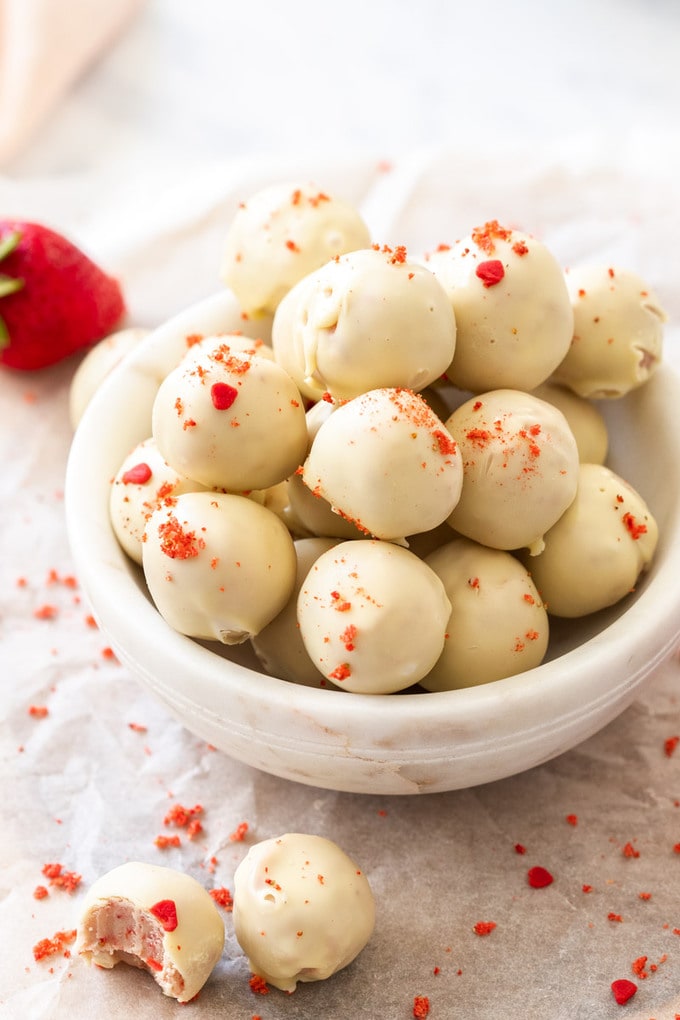 A batch of white chocolate truffles in a small white bowl