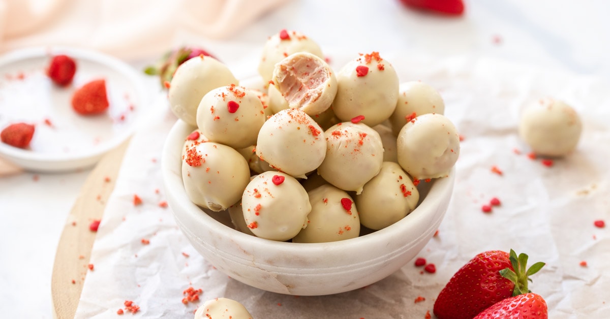 A batch of white chocolate truffles in a small white bowl