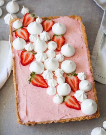 This Strawberry Mousse Tart is a soft silky real strawberry mousse, inside a crisp tart shell and topped with crispy meringue kisses. Such a beautiful Spring dessert.