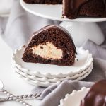 Chocolate Chip Bundt Cake with Cheesecake Filling is an easy chocolate bundt cake, filled with a gorgeous cheesecake filling and finished off with glorious dark chocolate ganache. #sugarsaltmagic #chocolatecake #chocolatebundtcake #bundtcake
