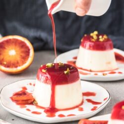 Buttermilk Panna Cotta is sweet and creamy but also a little tangy. A super quick and easy dessert, this one is topped with blood orange jelly.