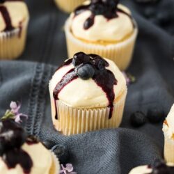 Fluffy and moist, Lemon Blueberry Cupcakes are filled with a surprise blueberry compote centre and a simple, creamy cream cheese frosting