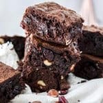 These Drunken Hazelnut Cranberry Brownies start with a classic chocolate brownie, filled with hazelnuts and cranberries soaked in Frangelico liqueur. They make the perfect Christmas brownies recipe.