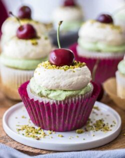 Cherry Pistachio Cupcakes are an amazing combination of pistachio cupcake, cherry compote centre and pistachio and vanilla buttercreams. All topped off with a gorgeous fresh cherry.