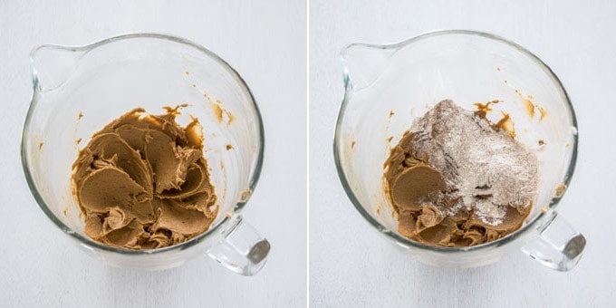 A glass bowl with dough for speculoos cookies in it