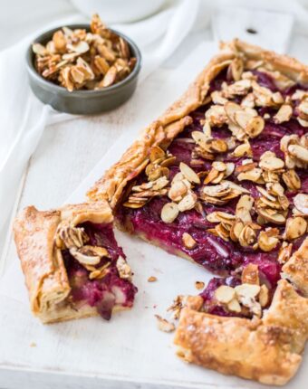 This rustic Almond Plum Tart recipe makes use of gorgeous fresh black plums teamed up with a hidden almond layer, all wrapped in a simple flaky pastry. A gorgeous Summer dessert.