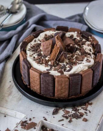 This No Bake Tim Tam Cheesecake is a double chocolate cheesecake inspired by Tim Tams. Layers of milk and dark chocolate cheesecake make this a stunning dessert.
