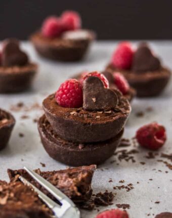 This Mini Chocolate Tart recipe is perfect for spoiling the ones you love. A simple but rich chocolate custard in a mini chocolate tart shell.