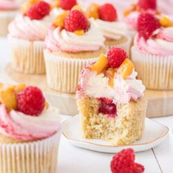 These Peach Melba Cupcakes are based on the classic Peach Melba dessert. Fabulous raspberry and peach cupcakes with a creamy vanilla frosting.