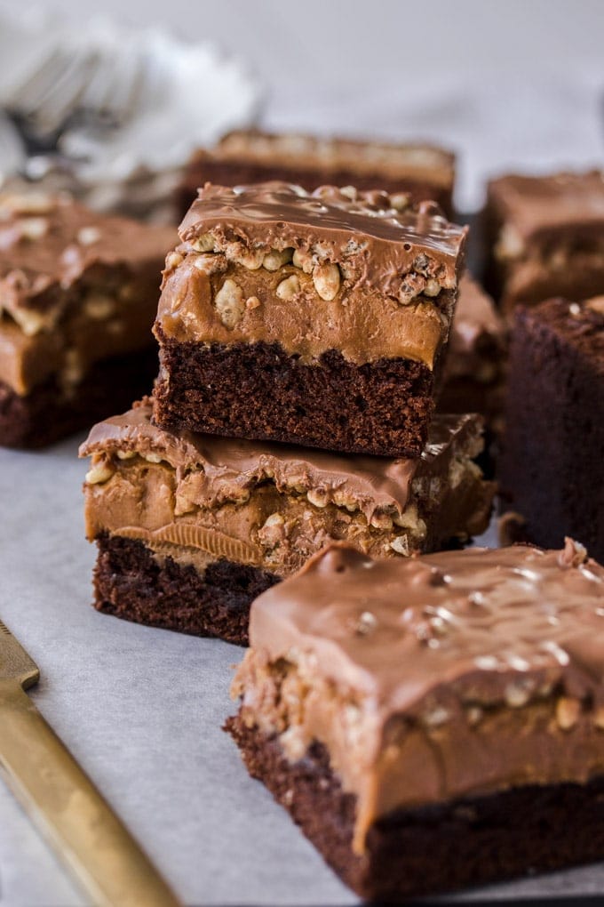 A stack of 2 Mocha fudge crunch bars with another in front.