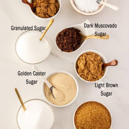 A graphic showing 8 different types of sugar in bowls