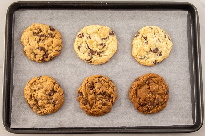 Six baked cookies on a baking tray
