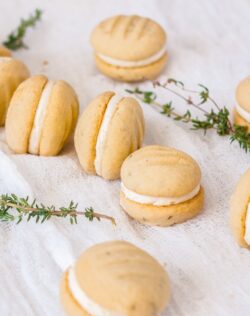 5 Lemon Melting Moments cookies surrounded by thyme