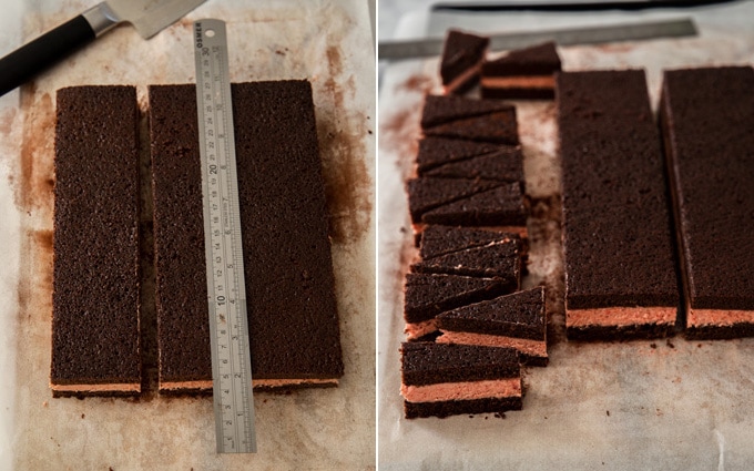 A image showing chocolate cake with strawberry buttercream in the middle being cut into mini triangles