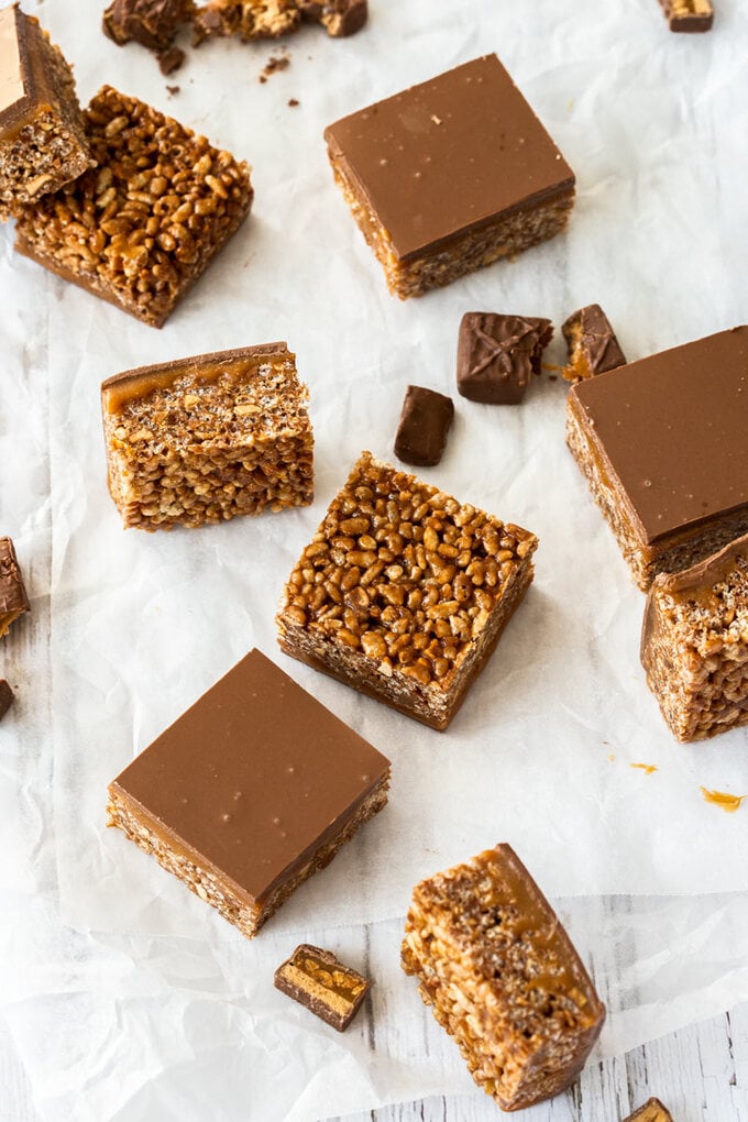 Chocolate rice krispies treats on a sheet of baking paper