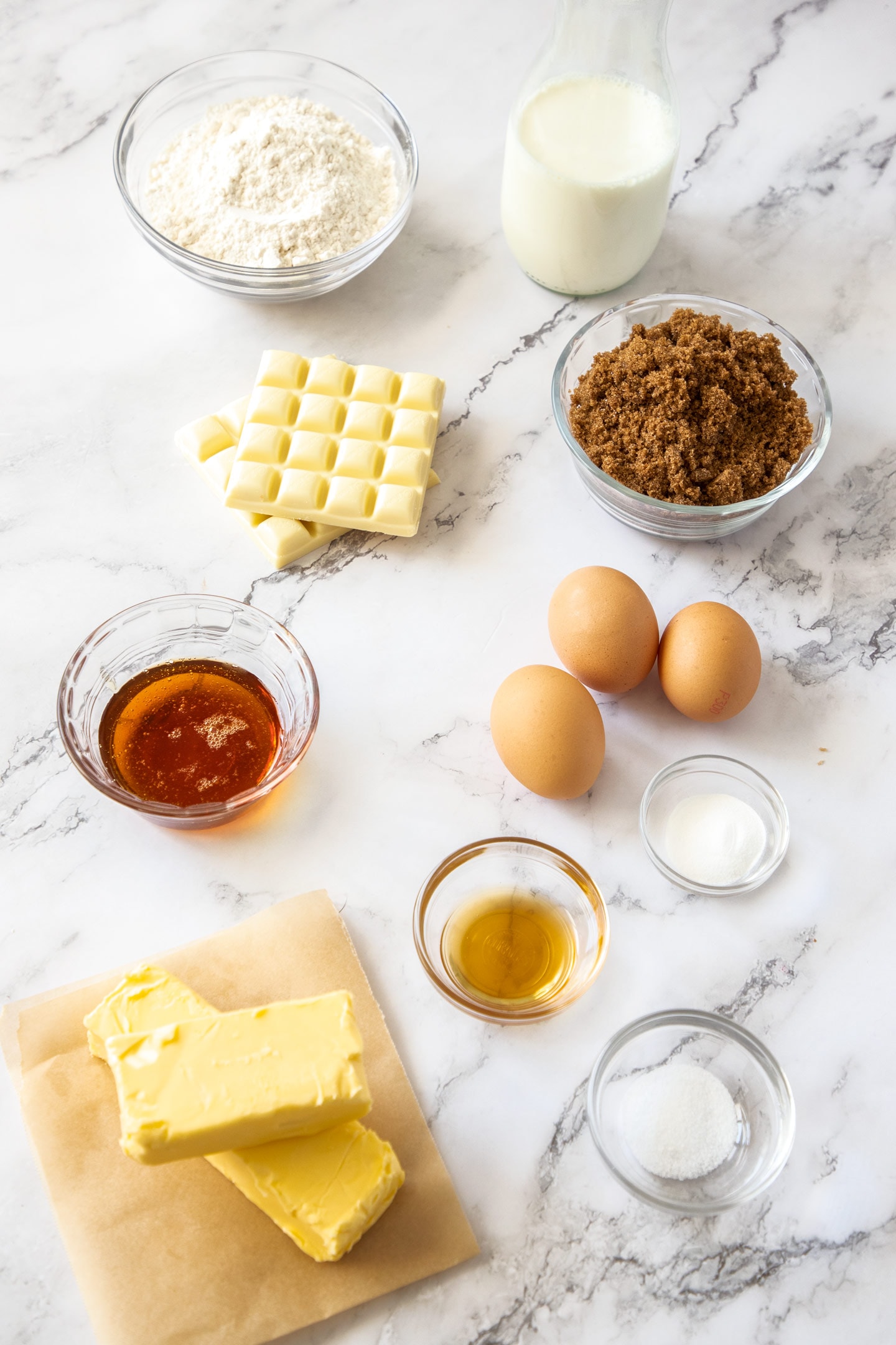 Ingredients for caramel mud cake on a marble surface