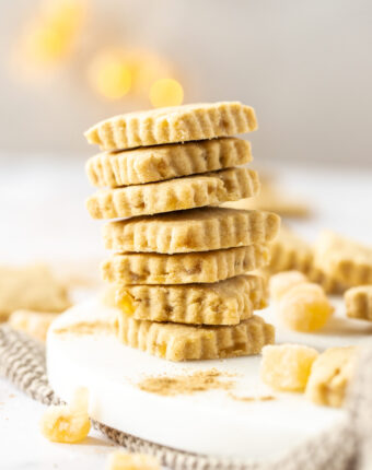 A stack of ginger shortbread on a white platter