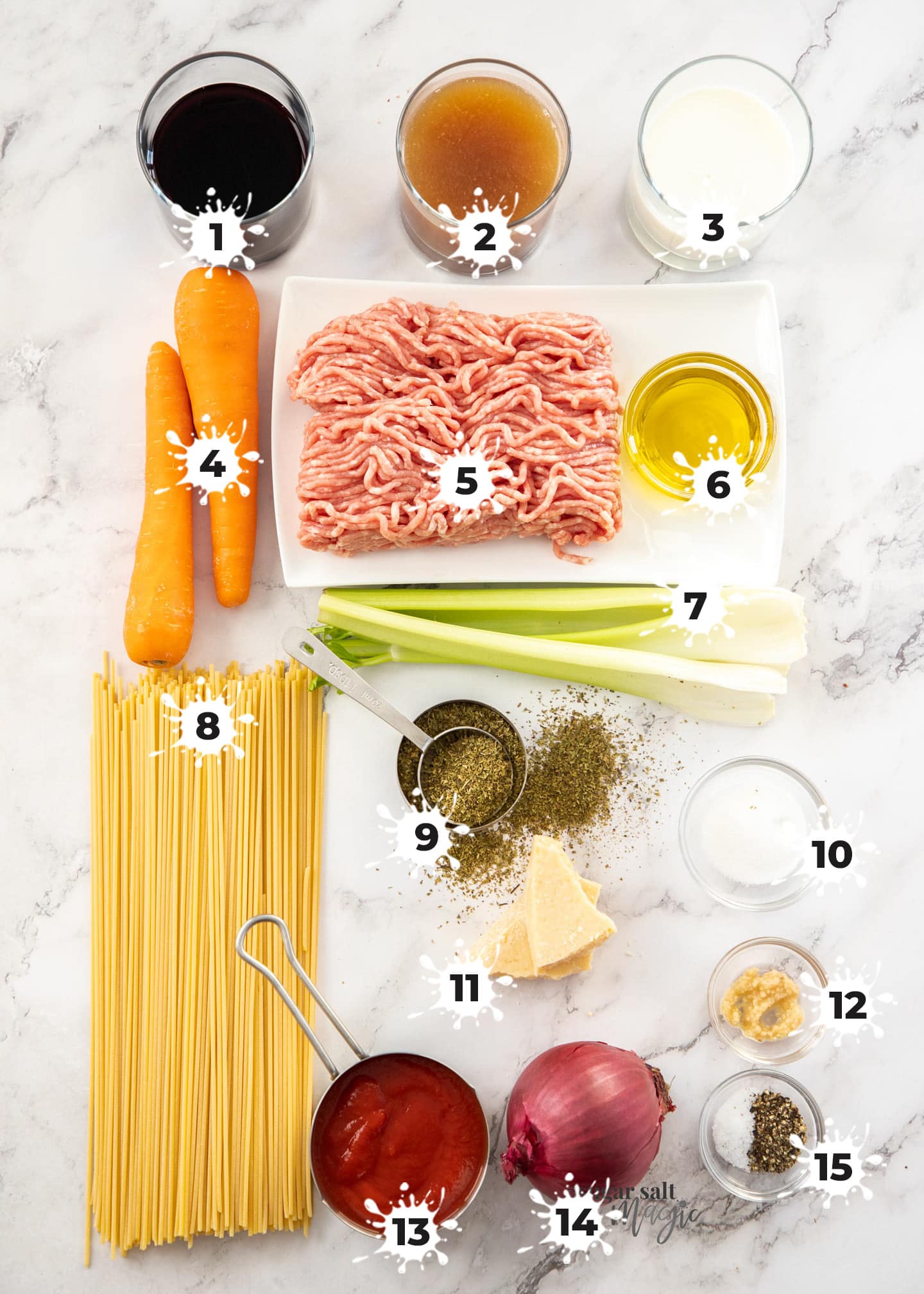 Ingredients for spaghetti bolognese on a marble worktop