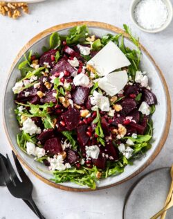 Birdseye view of a salad of beetroot, feta and greens