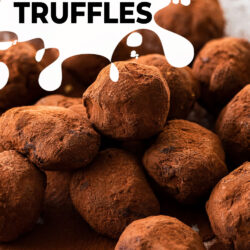 A pile of chocolate truffles on a grey plate