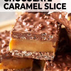 Closeup of a chocolate bar filled with caramel and rice krispies.