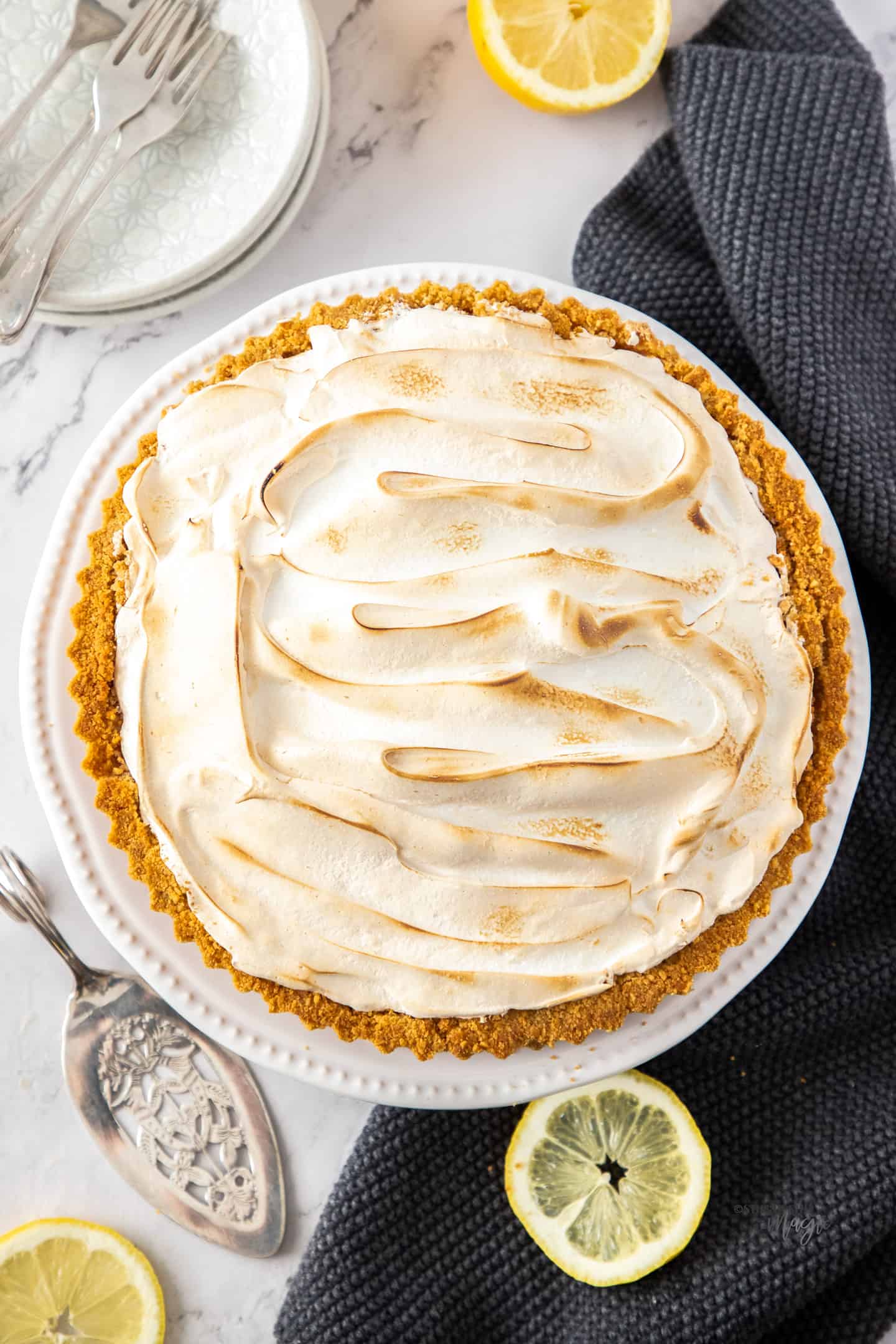 View of the toasted top of a lemon meringue pie.