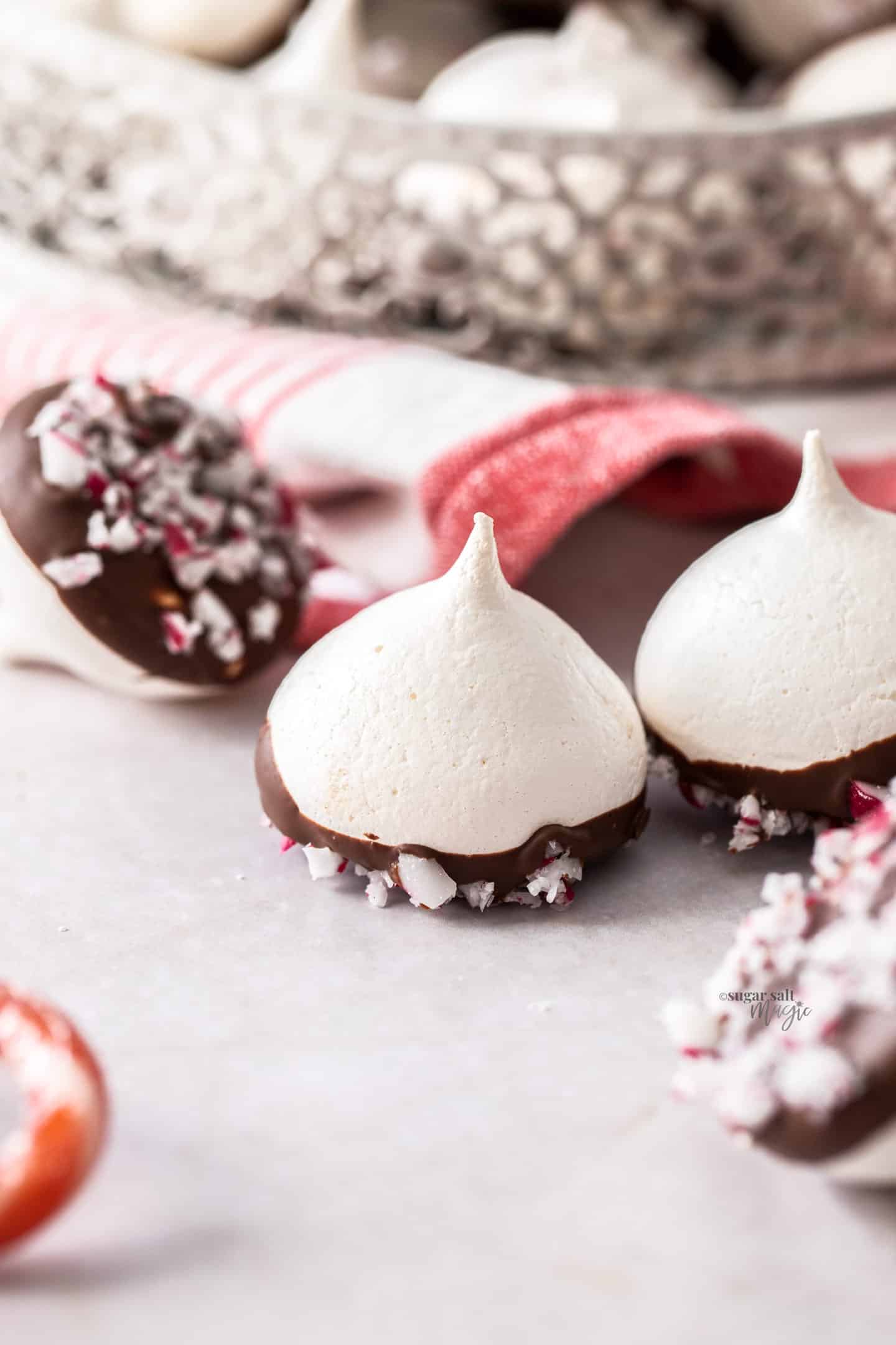 Closeup of a peppermint meringue with a chocolate base.
