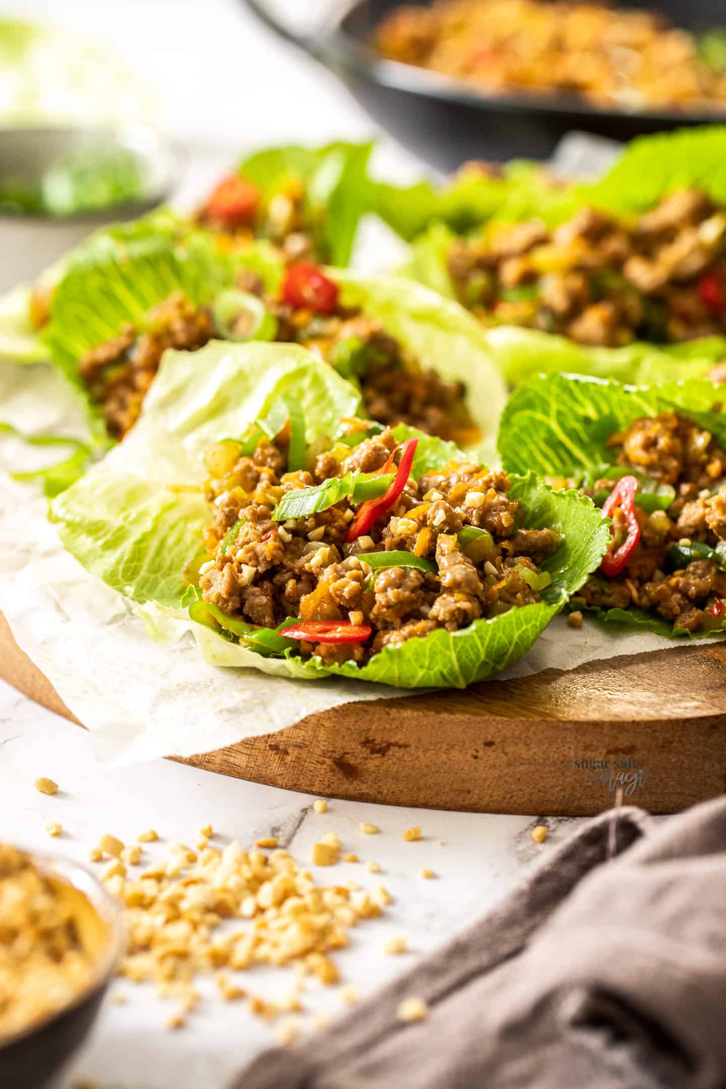A lettuce leaf filled with san choy bow meat filling.