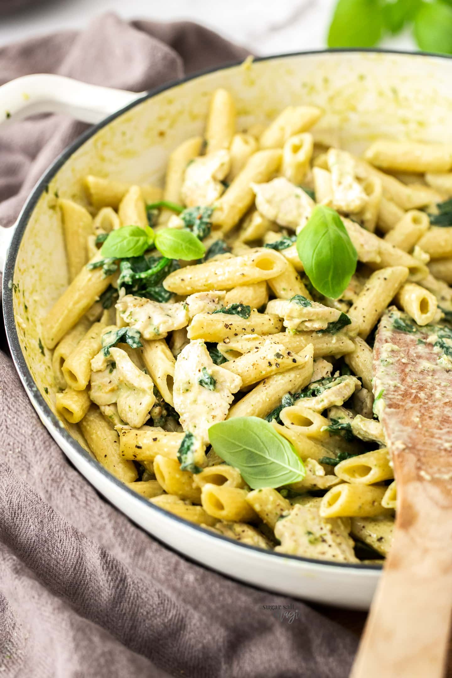 Creamy chicken pasta in a large skillet.