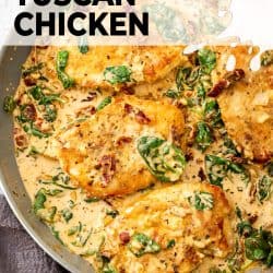 4 pieces of cooked chicken in a creamy sauce in a large skillet.