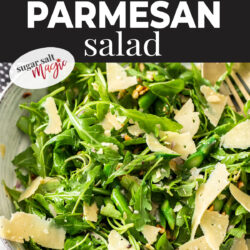 Closeup of asparagus, rocket adn parmesan salad.