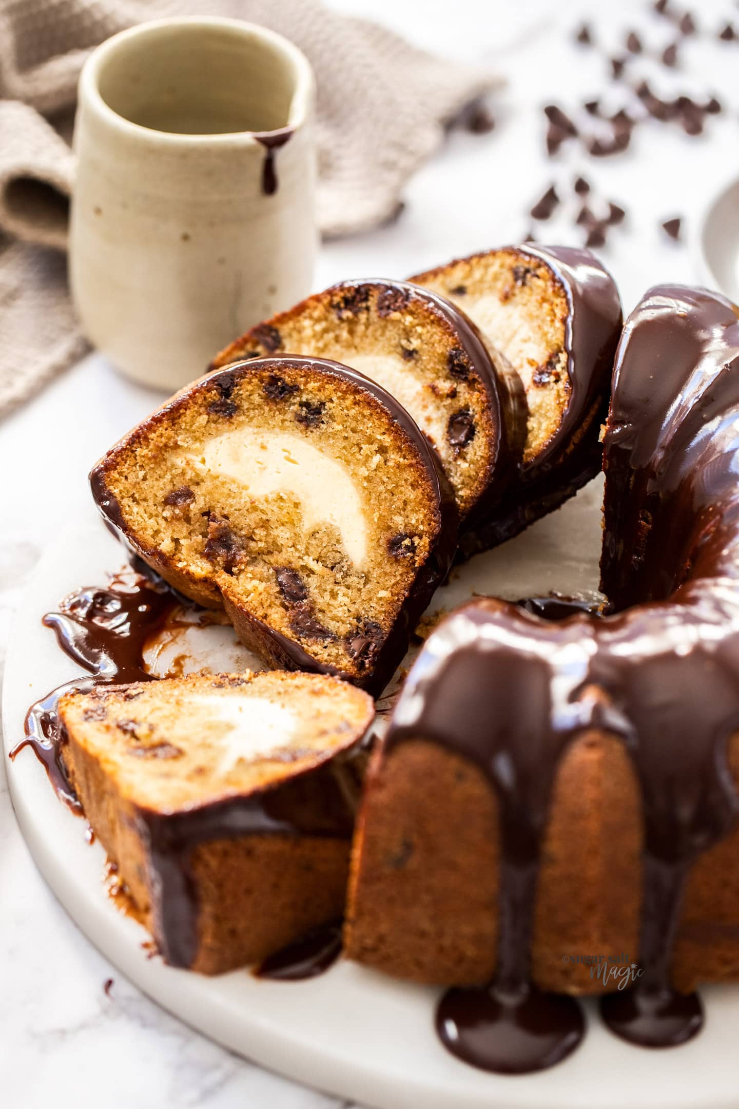 Slices of chocolate chip bundt cake leaning up against each other.
