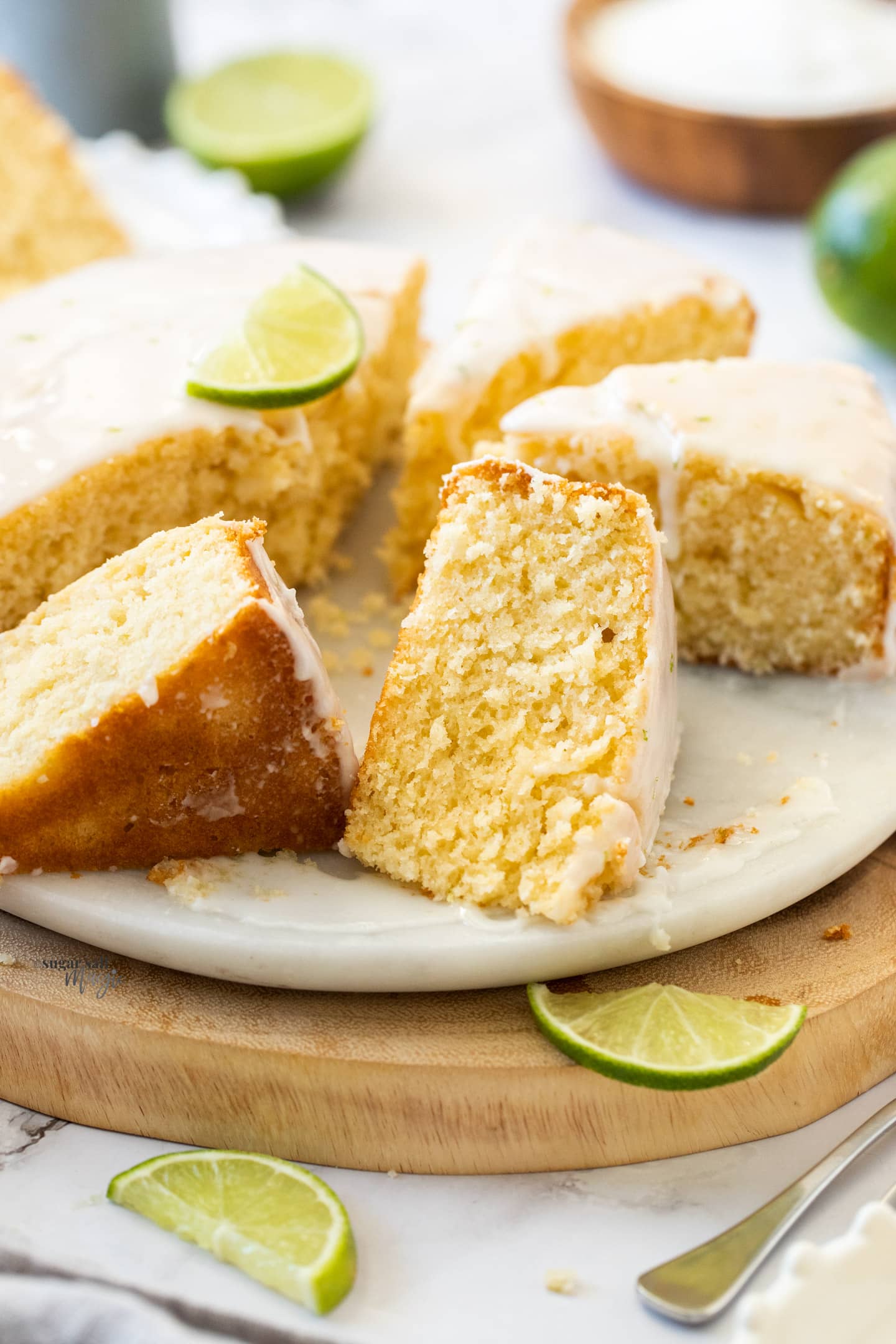 Closeup of a slice of lime and coconut cake.