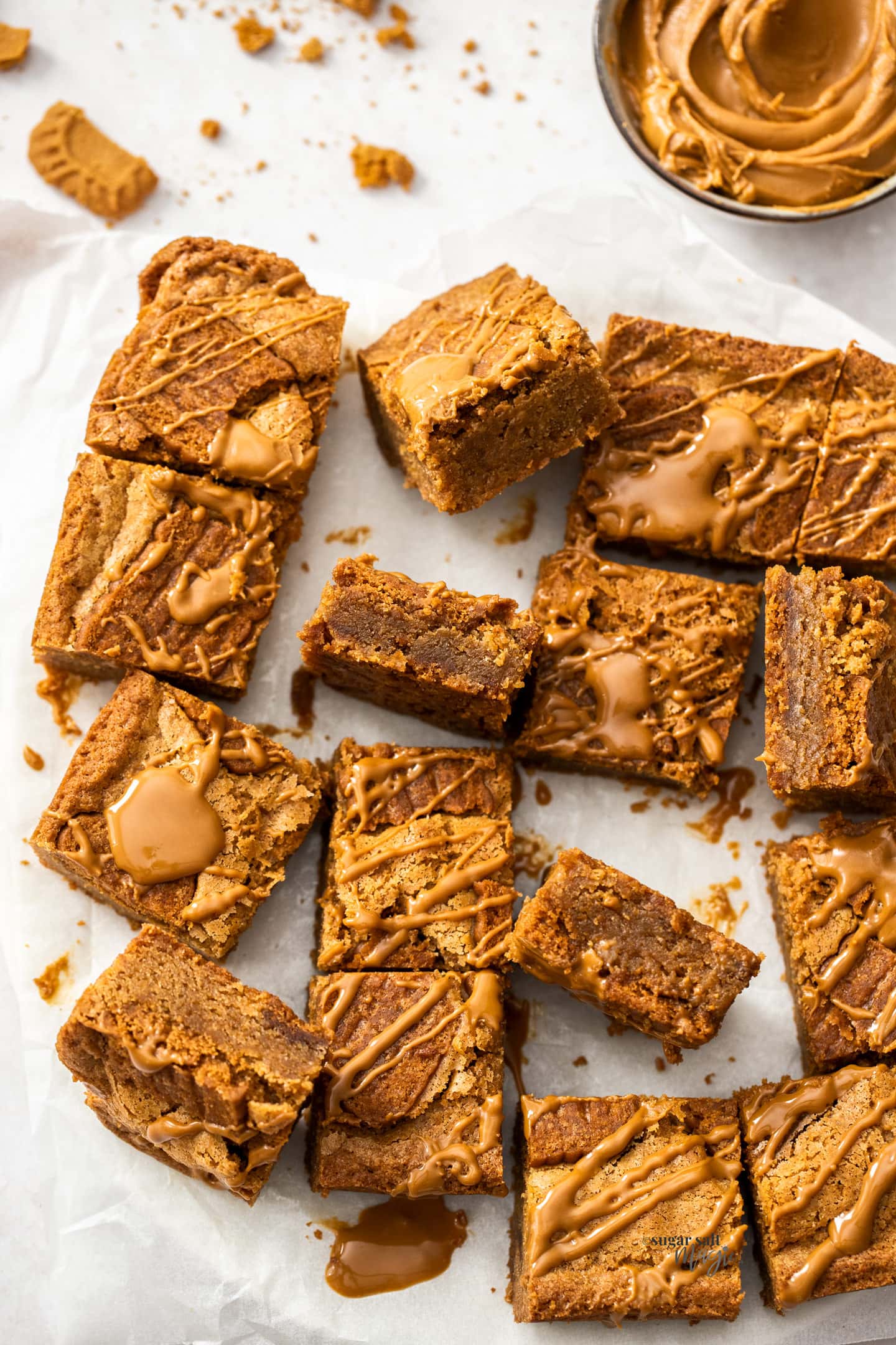 A batch of Biscoff blondies showing the texture of the inside.