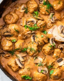 A large skillet filled with meatball stroganoff.