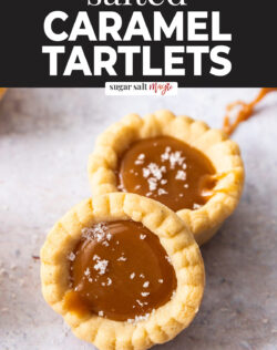 Two mini salted caramel tartlets sitting next to each other.