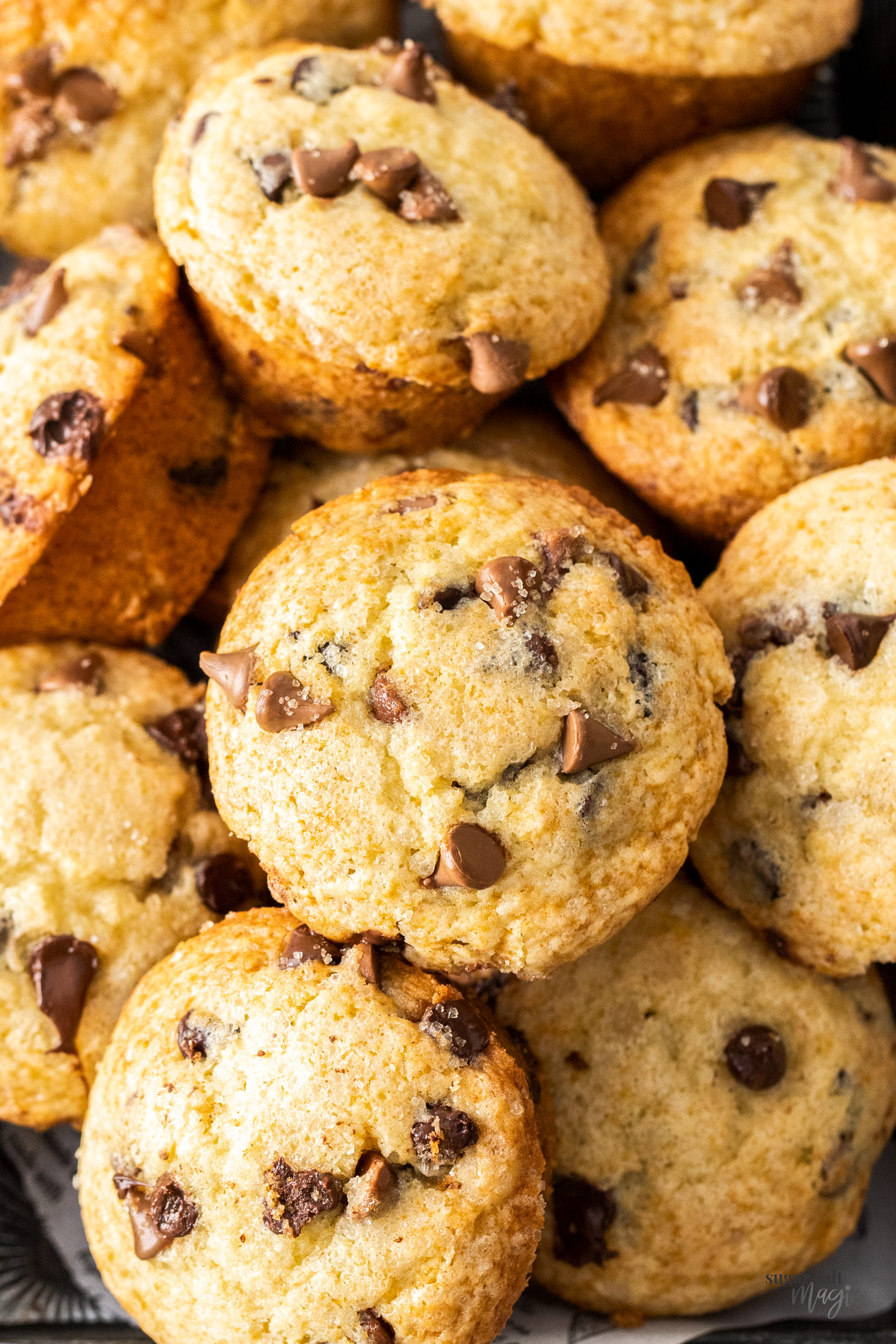 Closeup of a batch of chocolate chip muffins.