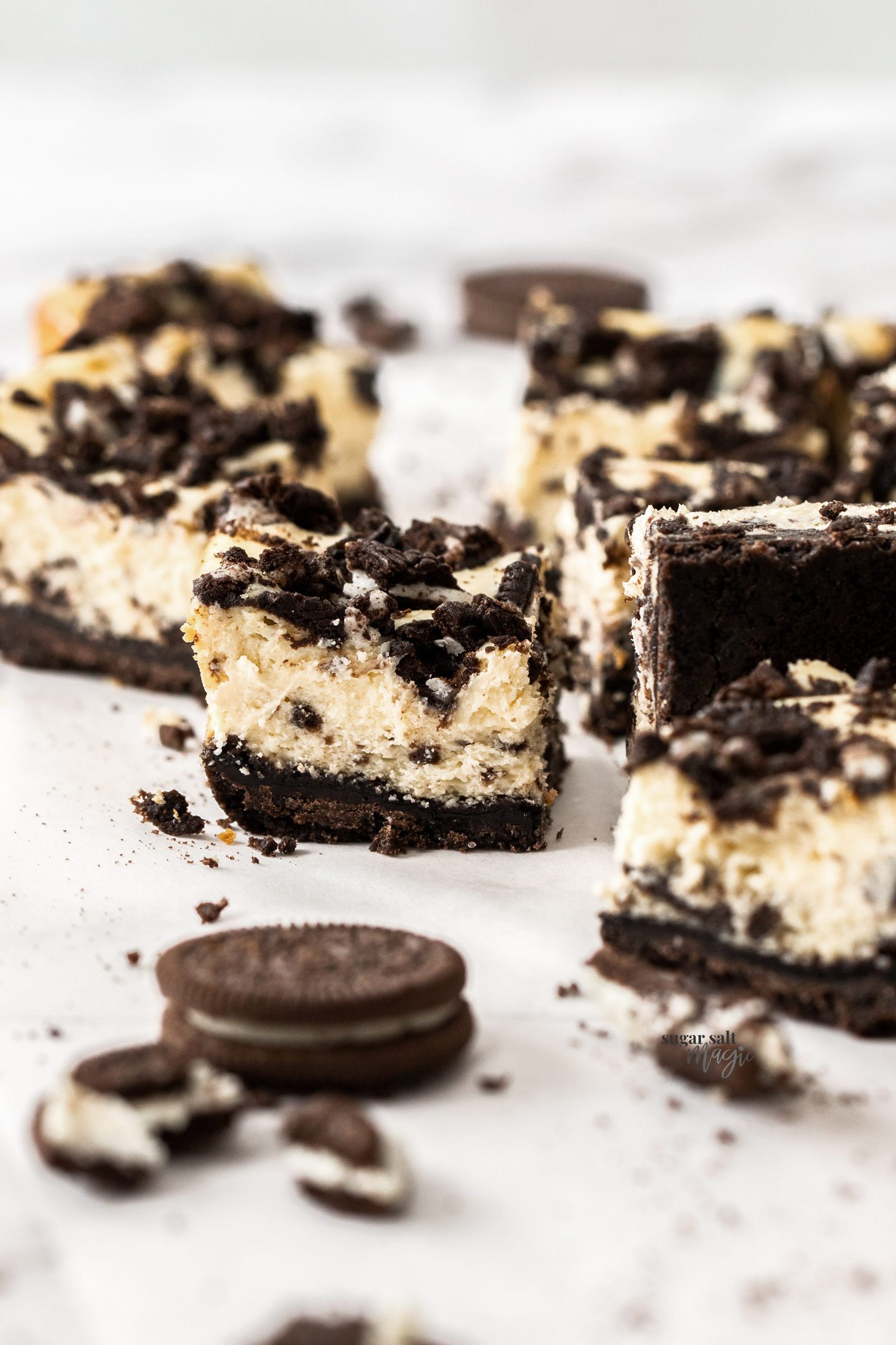 Close up of the inside of an Oreo cheesecake bar.