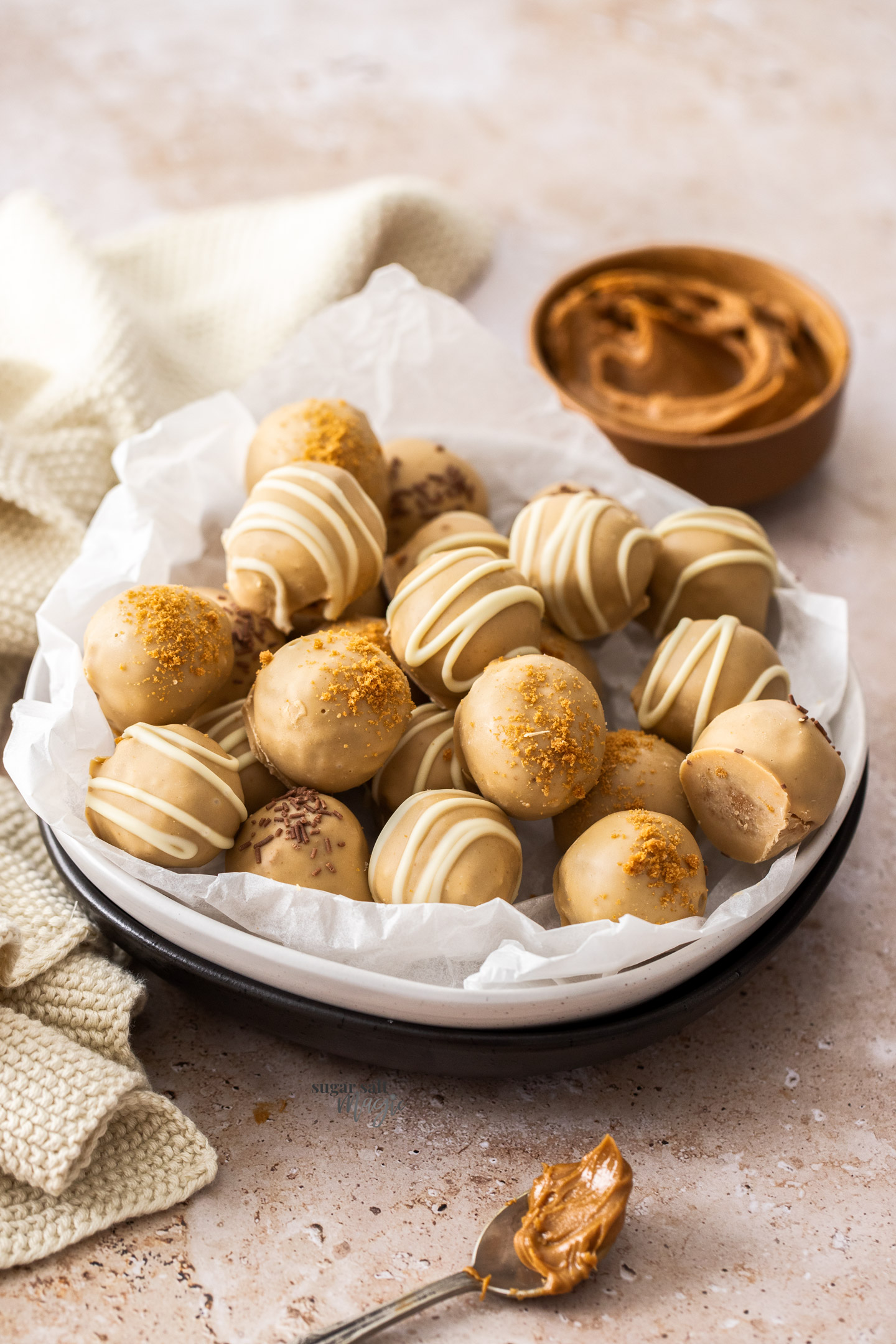 A plate filled with Biscoff truffles.