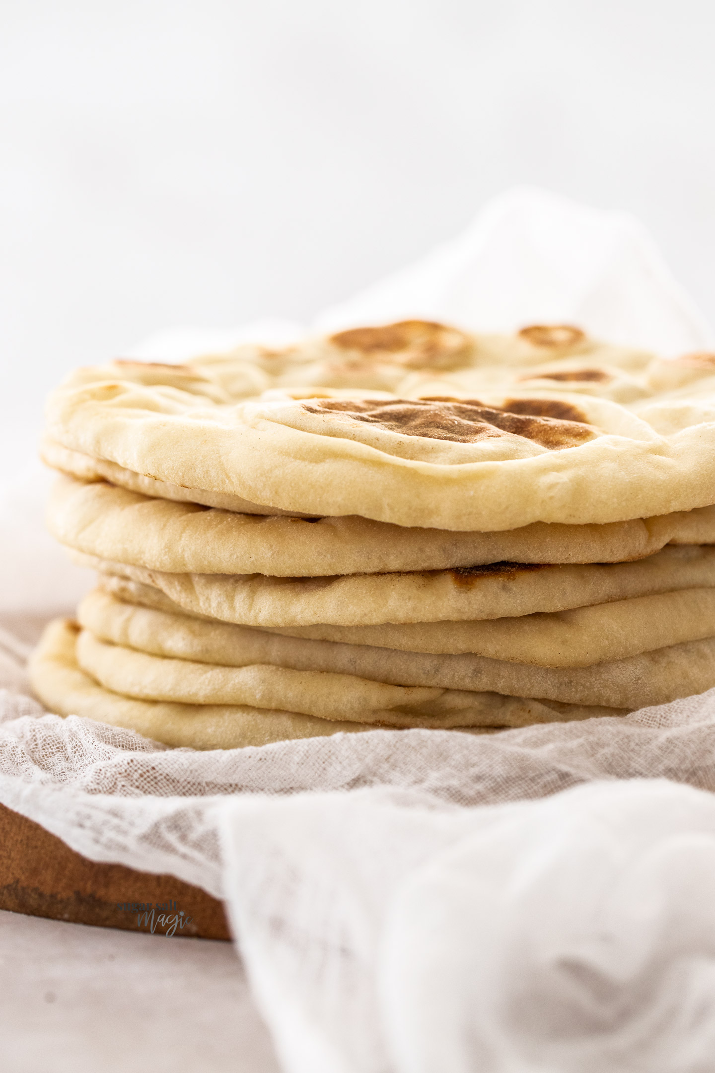 Side on view of a stack of flatbread showing their thickness.