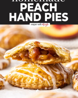 A hand pie broken in half to show the peach filling.